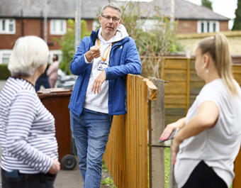 An image of staff and customers on an estate walkabout