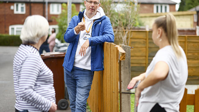 An image of staff and customers on an estate walkabout